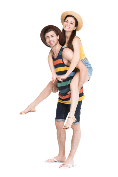 sorrindo homem piggybacking sua bela namorada, isolado no branco
  - Foto, Imagem