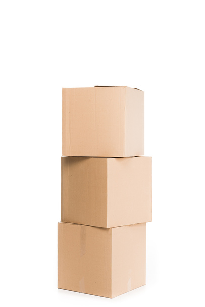 stacked cardboard boxes, isolated on white - Photo, Image