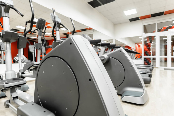 Gym interior with sport equipment - Foto, Bild