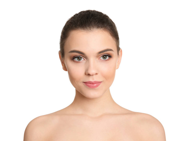 Young woman with beautiful makeup on white background. Professional cosmetic products - Zdjęcie, obraz