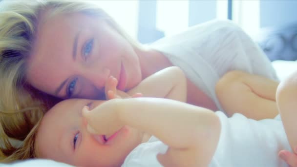 Little Blonde Haired Girl Playing Mother - Footage, Video
