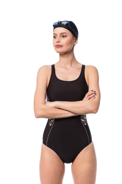 Swimmer women in swimming suit standing with folded arms looking one side with confidence, isolated on white background - Φωτογραφία, εικόνα