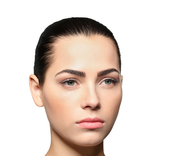 Young woman with beautiful eyebrows on light background - Zdjęcie, obraz