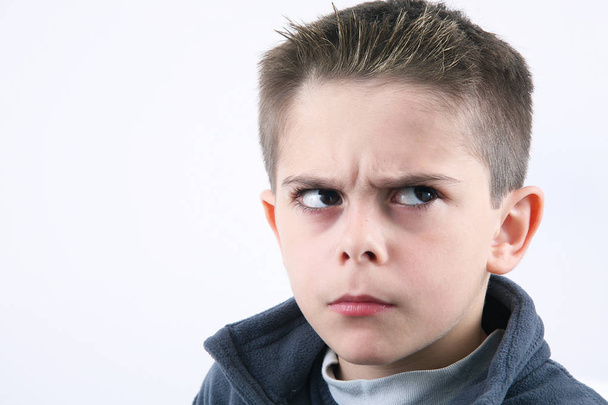 angry young boy in white background - Foto, Bild