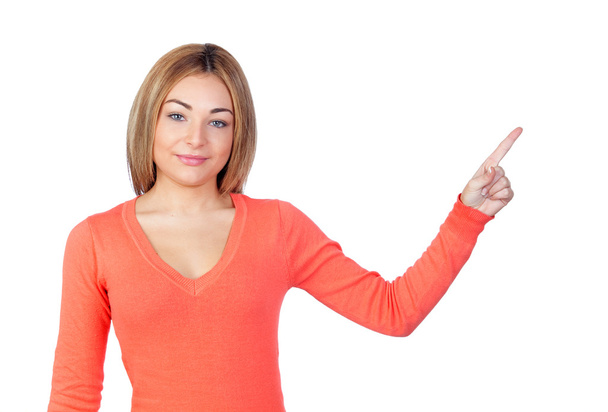 Attractive girl pointing to something - 写真・画像