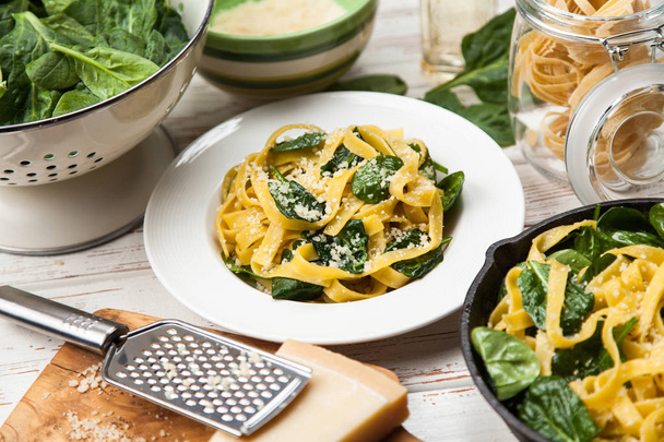 Spinach tagliatelle pasta - Photo, Image