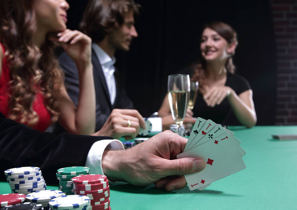 Closeup of poker hand of aces in pastel colors - Foto, Bild