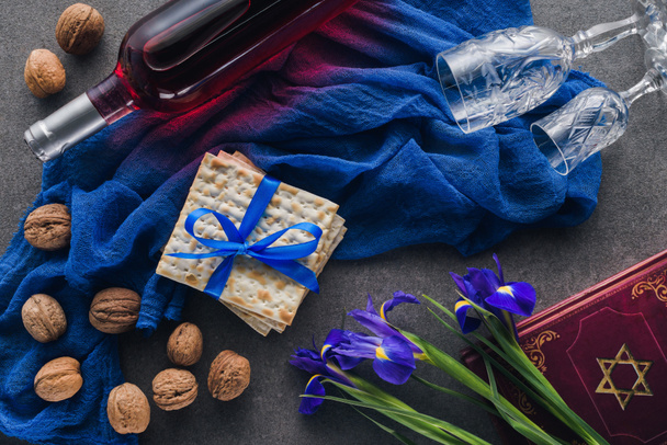 top view of matza, torah and wine on table, jewish Passover holiday concept - Fotó, kép