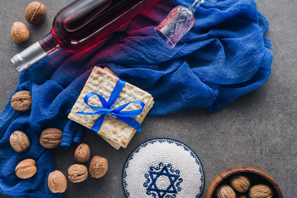 top view of matza, kippah and wine, jewish Passover holiday concept - Photo, Image