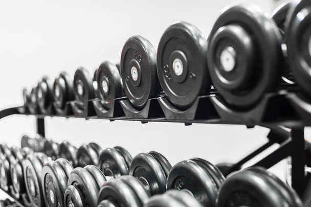 Iron dumbbells in the sport gym - Φωτογραφία, εικόνα