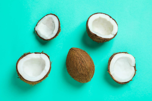 Ripe coconuts on color background - Valokuva, kuva
