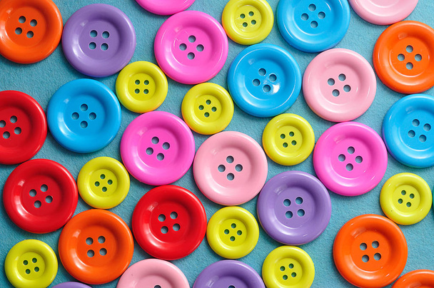 Un marco completo de botones de colores para coser
 - Foto, imagen