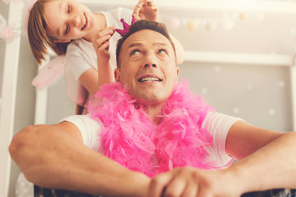 Nice handsome man spending time with his daughter - 写真・画像