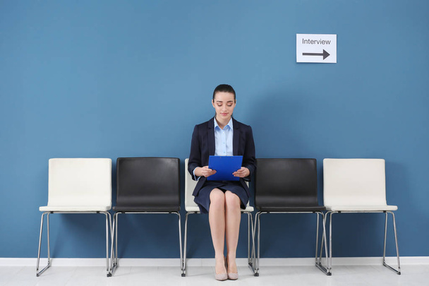 Young woman waiting for job interview, indoors - Photo, Image
