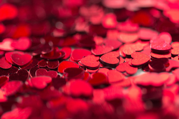 red heart-shaped paillettes - Valokuva, kuva