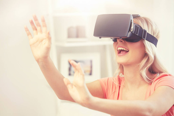 woman in virtual reality headset or 3d glasses - Photo, image