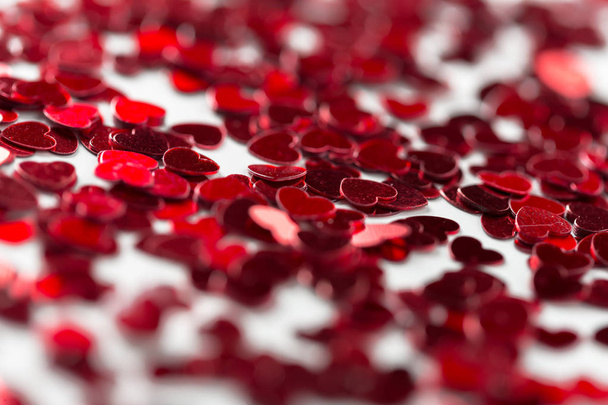 red heart-shaped paillettes - Fotografie, Obrázek