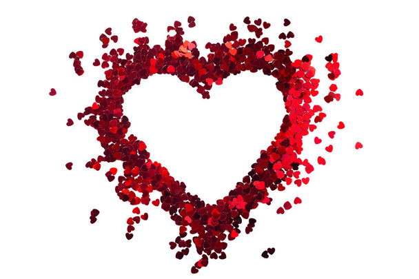 red heart-shaped paillettes - Foto, afbeelding