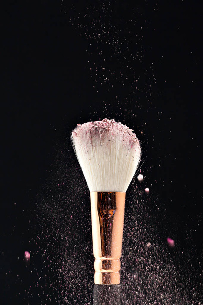 Professional black make-up brush with pink powder - Фото, зображення