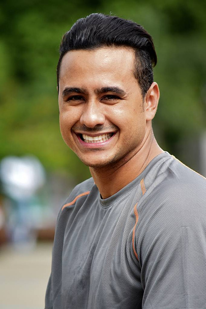 Smiling Colombian Male Athlete - 写真・画像