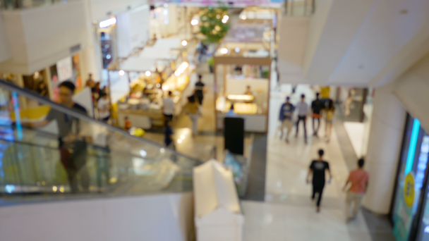 Nube de fondo borrosa abstracta de personas que se mueven en el centro comercial
 - Imágenes, Vídeo