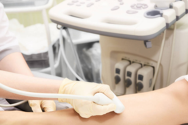 Apparatus ultrasound examination. Doctors work. Medical research. Patients foot - Фото, зображення