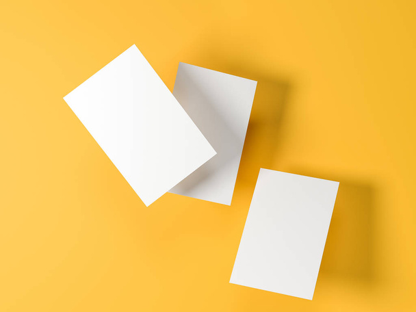 render 3d images of business cards dynamically scattered on a yellow background. - 写真・画像