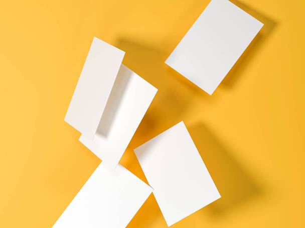 render 3d images of business cards dynamically scattered on a yellow background. - Fotó, kép