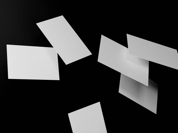 render 3d images of business cards dynamically scattered on a black background. - 写真・画像