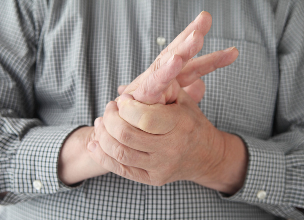Man with numbness in hand - Fotó, kép