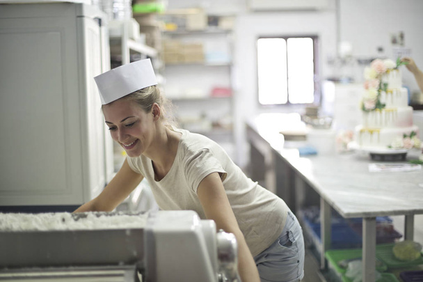 Pastry girl at work in her laboratory  - Fotografie, Obrázek