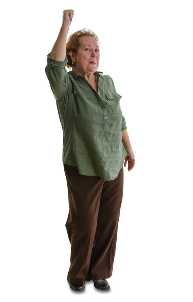 Happy senior woman standing with arm raised - Фото, зображення