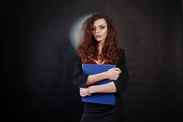 Brunette curly haired girl in black office jacket with skirt, on - Фото, зображення