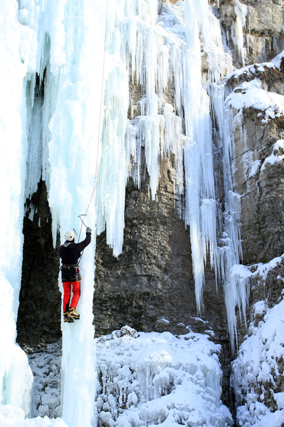 Ice climbing the waterfall. - Foto, Imagem