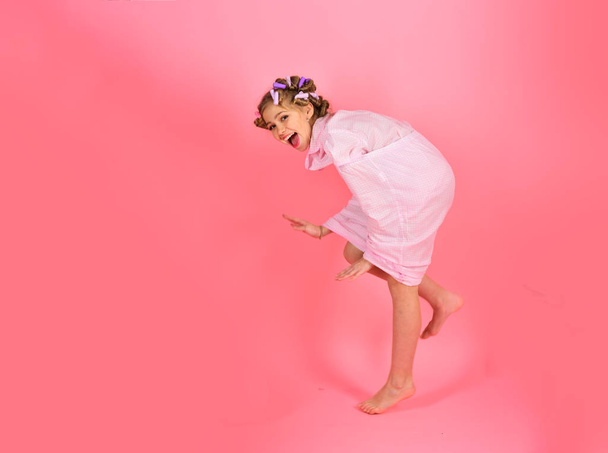 Portrait of cute girl with pink pajama having fun - Foto, Imagem