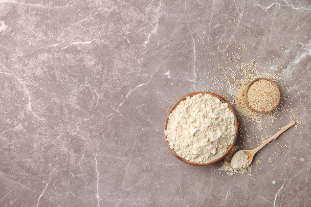 Composition with sesame flour on table - Foto, Bild