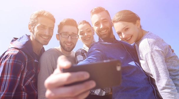 group of students taking a selfie - Фото, изображение