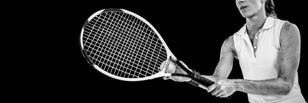 Athlete playing tennis with a racket on white background - Foto, afbeelding