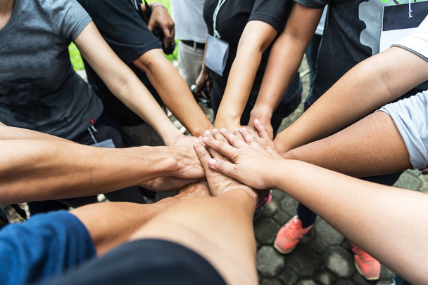 Group of people United Hands to built teamwork together with Spirit - teamwork concepts. - Photo, Image