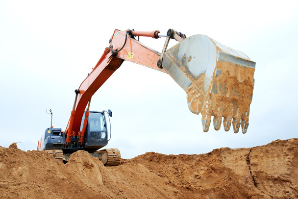 Track-type loader excavator at work - Foto, Imagen