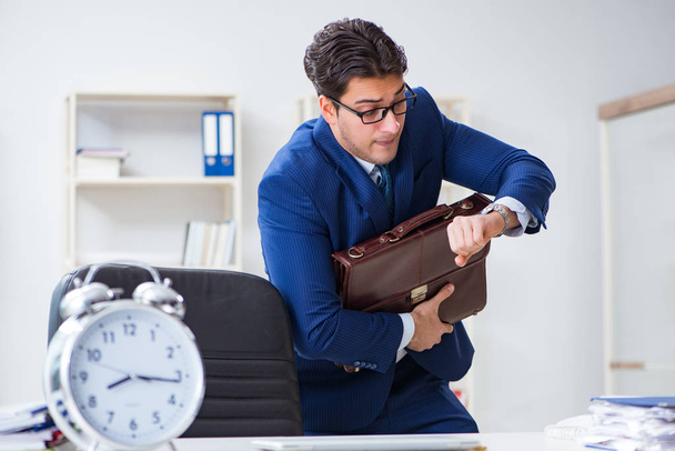 Businessman in bad time management concept - Photo, Image