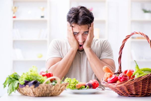 Young man in healthy eating and dieting concept - Фото, изображение