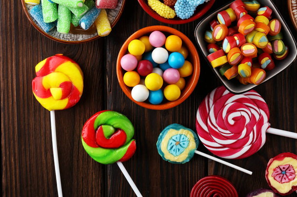 bonbons avec de la gelée et du sucre. tableau coloré de différents enfants
 - Photo, image