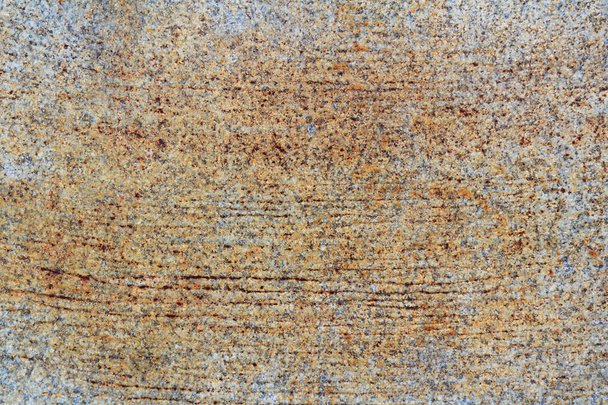 Granite slab with scratches and brown stains. Natural stone texture - Photo, Image