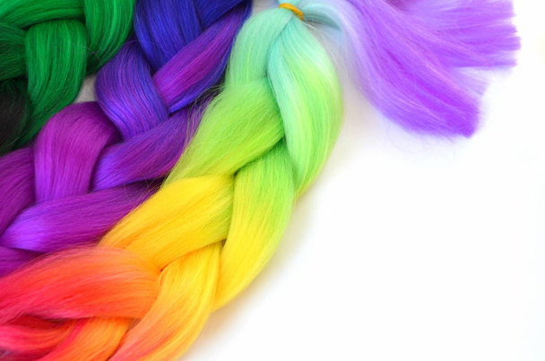 Kanekalon. Colored artificial strands of hair. Material for plaiting braids. - Photo, Image