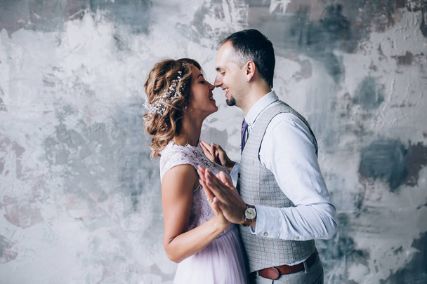Photo session of the newlyweds in the studio. - Фото, зображення