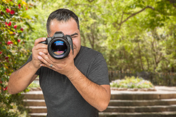Hispanic Young Male Photographer With DSLR Camera Outdoors - Photo, Image