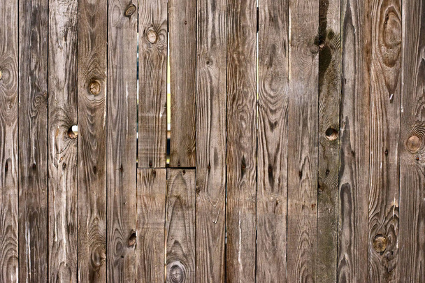 Background of natural knotted wood fence. Wooden texture. - Photo, Image