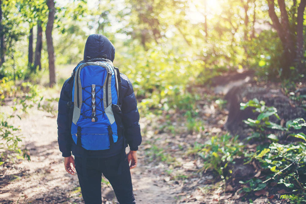 Hiker man adventure on vacation. Holiday tourism concept. - Foto, Bild