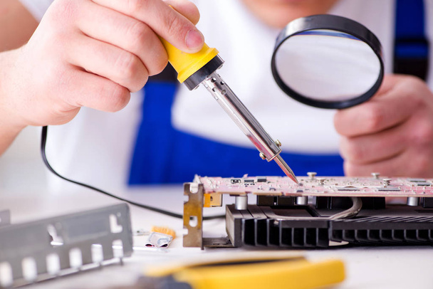 Computer hardware repair and fixing concept by experienced techn - Photo, Image